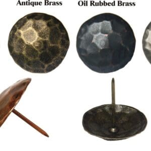 Four decorative nails in various finishes.